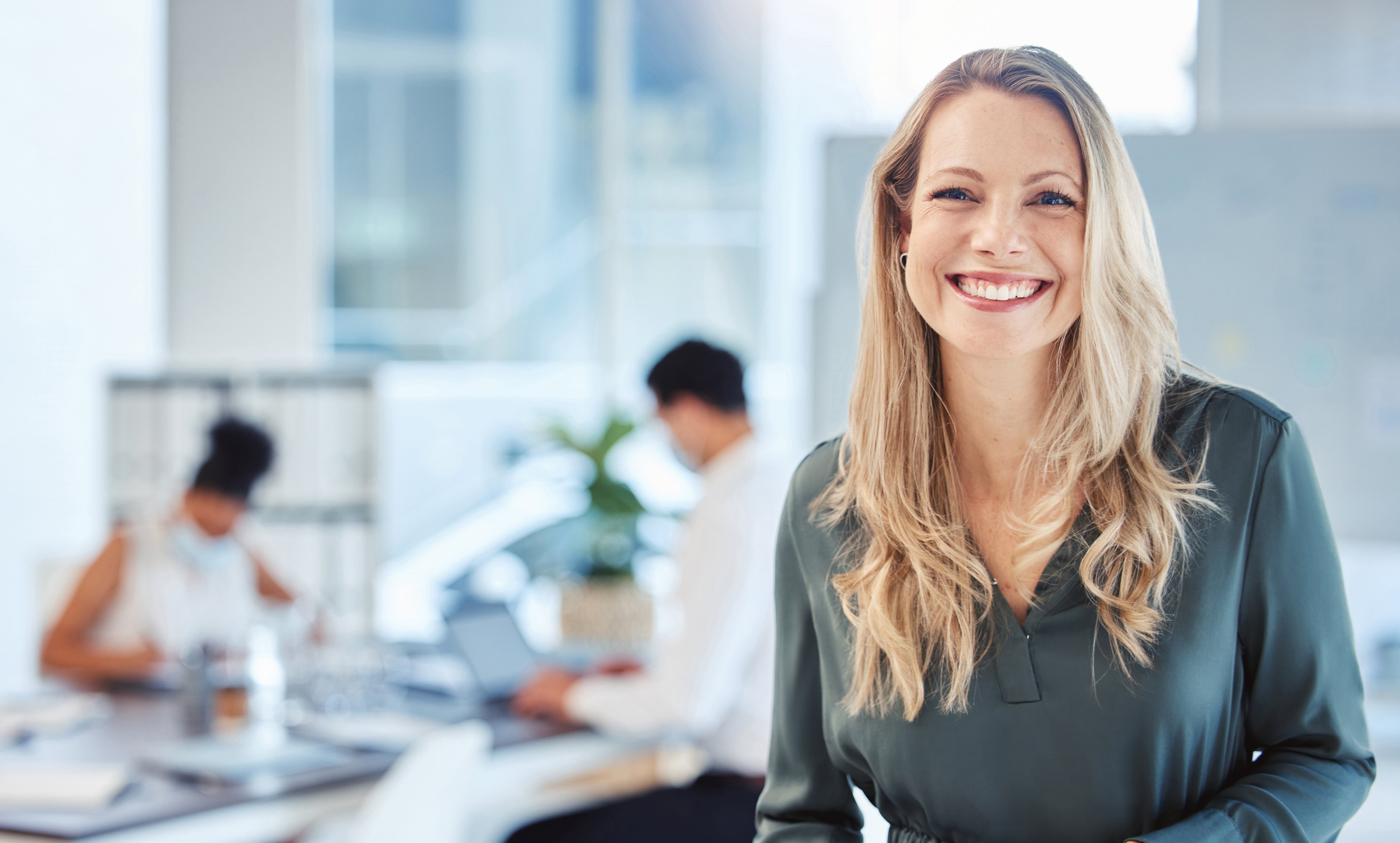 Professional office background with team members